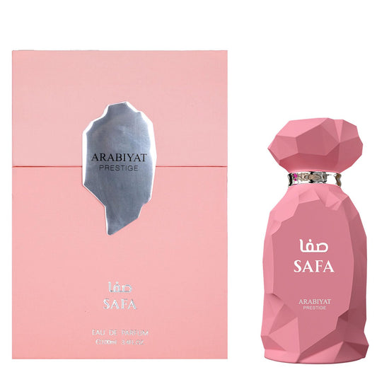 Pink geometric perfume bottle and matching box labeled Safa Arabiyat Prestige Eau de Parfum