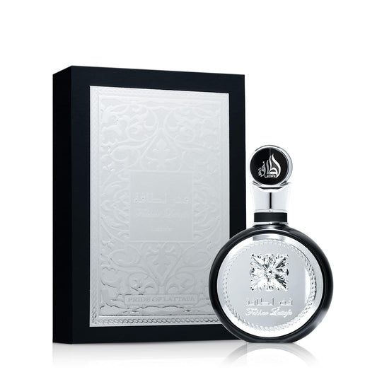 Luxury silver perfume bottle with embossed black and white gift box, elegant floral design