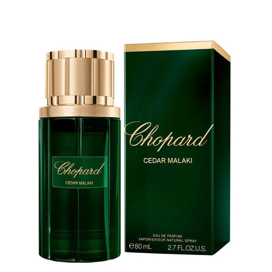 Chopard Cedar Malaki perfume bottle and box, luxury fragrance, gold and green design