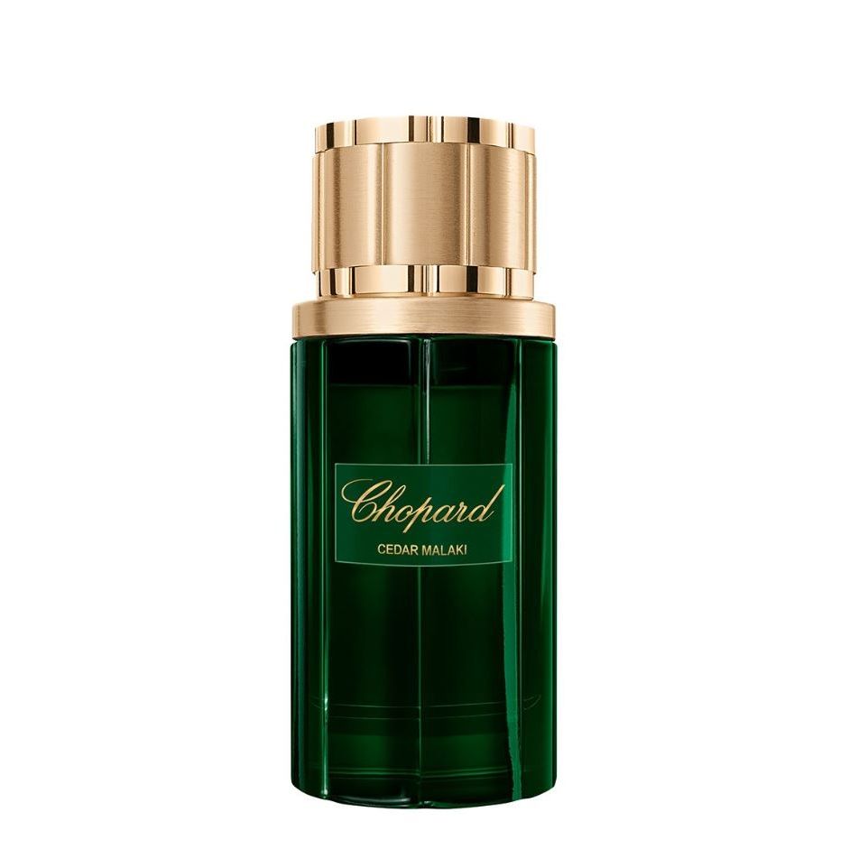 Chopard Cedar Malaki perfume bottle, green glass with gold cap, luxury fragrance