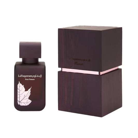 LaYuqawam Pour Femme perfume bottle with leaf design and matching dark wooden box