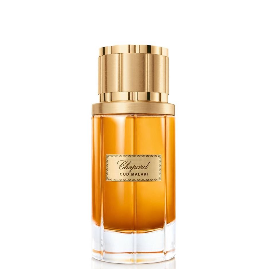 Chopard Oud Malaki luxury perfume with golden cap and amber scent