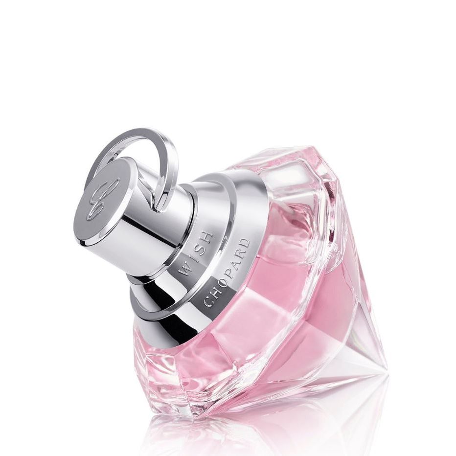 Chopard Wish perfume bottle with pink fragrance in diamond-shaped glass and silver cap