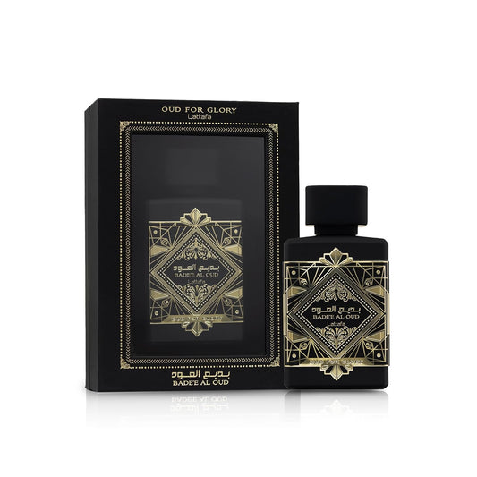 Lattafa Badee Al Oud perfume bottle and box with gold geometric design, luxury fragrance