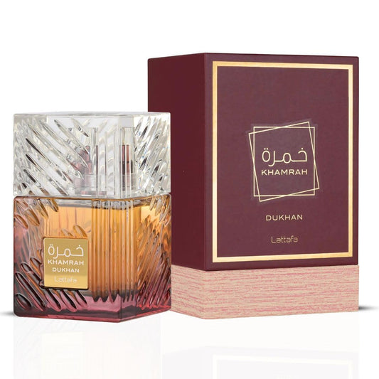 Lattafa Khamrah Dukhan perfume bottle with matching maroon box, luxury fragrance display