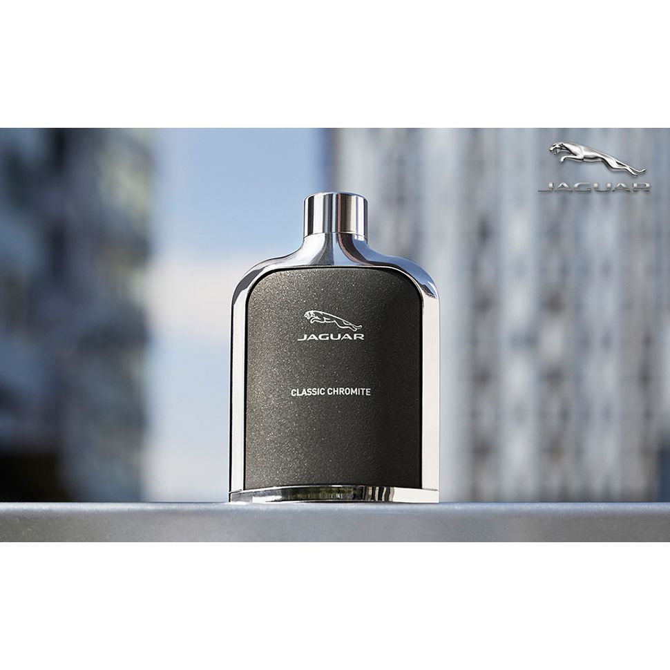 Jaguar Classic Chromite cologne bottle with urban background, luxury men's fragrance