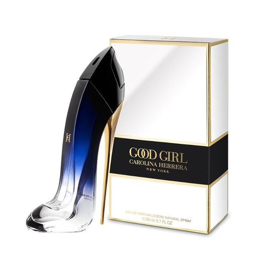 Carolina Herrera Good Girl perfume in high heel-shaped bottle beside branded box