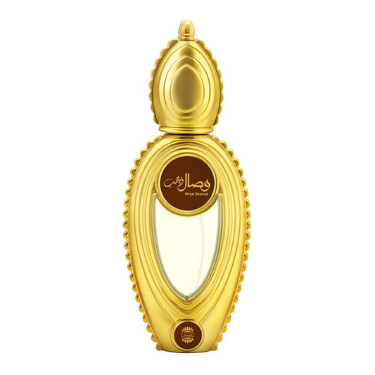 Gold ornate Wisal Dhahab perfume bottle, clear glass center, luxury fragrance product