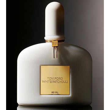 White ribbed glass perfume bottle with gold label and cap, labeled White Patchouli, 50ml