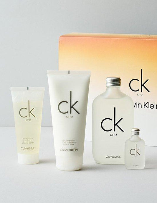 Calvin Klein CK One unisex perfume set with body wash, moisturizer, and travel spray