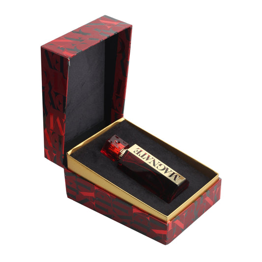 Red perfume bottle labeled MAGNATE in decorative gift box, luxury fragrance product