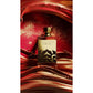 Afnan Edict Ouddiction perfume bottle with gold cap on swirling red and gold background