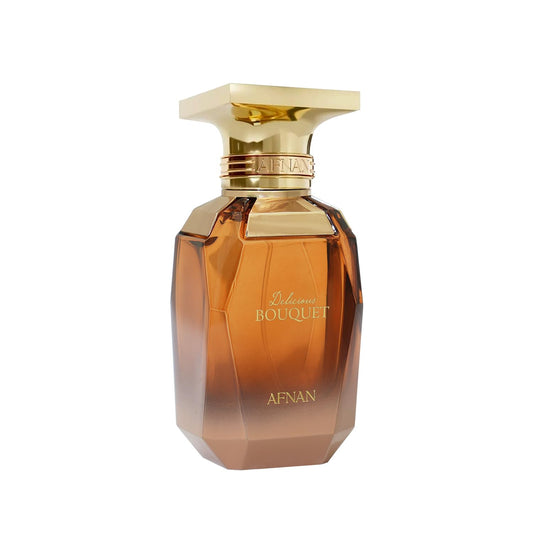 Afnan Delicious Bouquet perfume bottle with gold cap and amber glass on white background