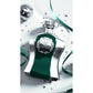 Elegant green and silver perfume bottle labeled His Highness, surrounded by festive ribbons and stars.