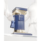 Luxury Afnan Historic Olmeda perfume bottle in blue and gold with a tassel, styled like a column