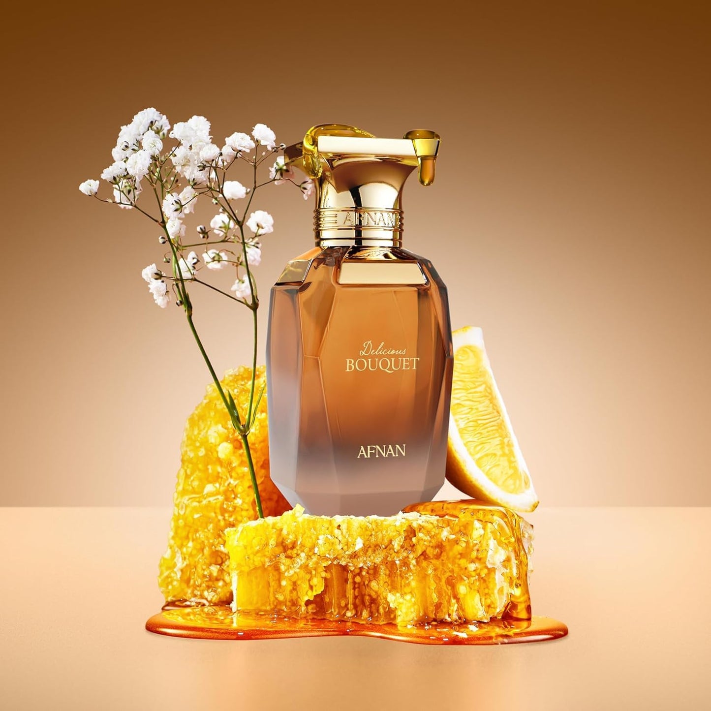 Afnan Delicious Bouquet perfume bottle with honeycomb, orange slice, and white flowers