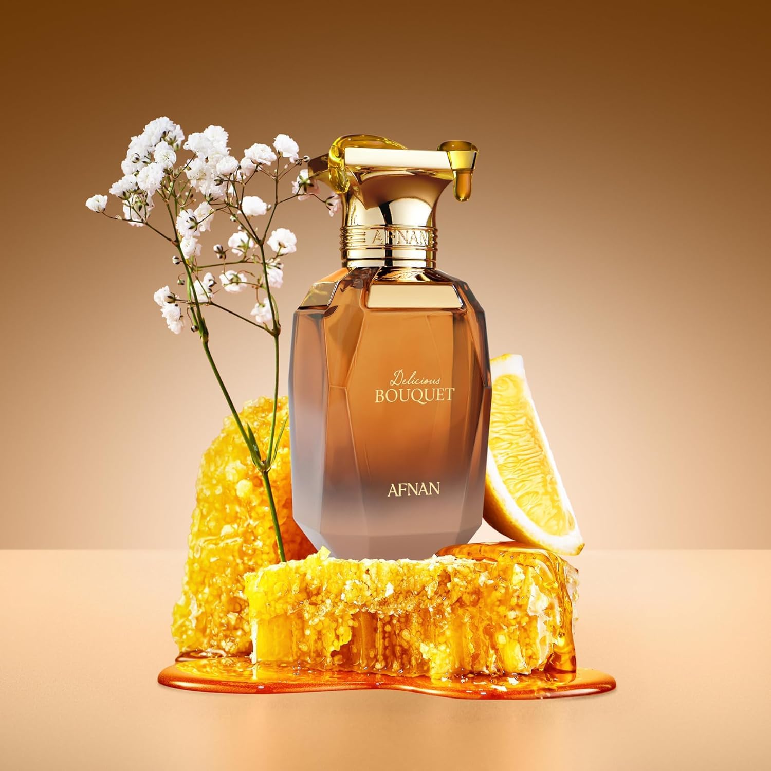 Afnan Delicious Bouquet perfume bottle with honeycomb, orange slice, and white flowers