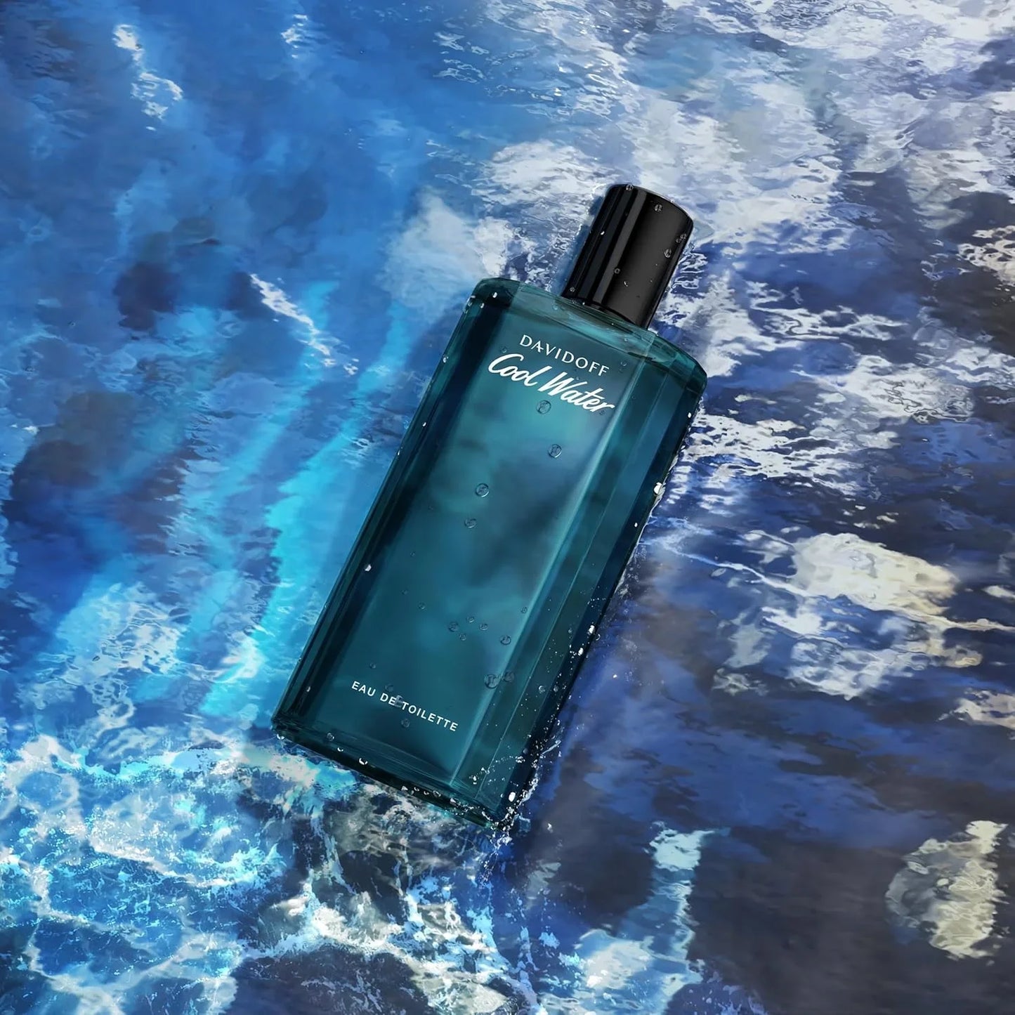 Davidoff Cool Water eau de toilette bottle on blue water with reflections