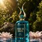 Luxury Rose de Soleil perfume bottle with gold cap, floating on water with lotus flowers, evoking oud and Arabic fragrance elegance.