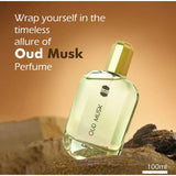Clear glass bottle of Oud Musk perfume 100ml with gold cap, displayed on natural rocks