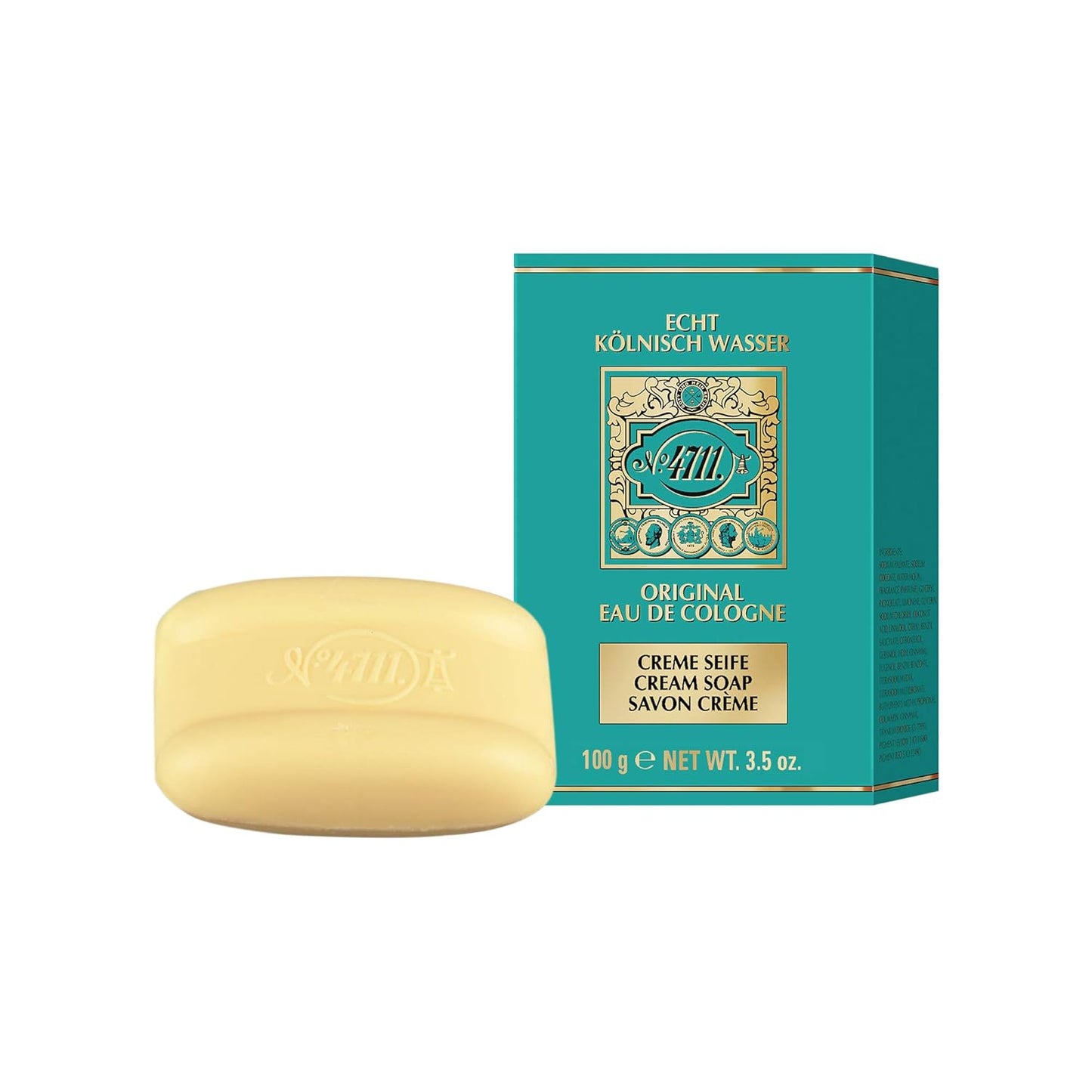 Cream soap bar with embossed logo next to teal and gold packaging, 100g, skincare product