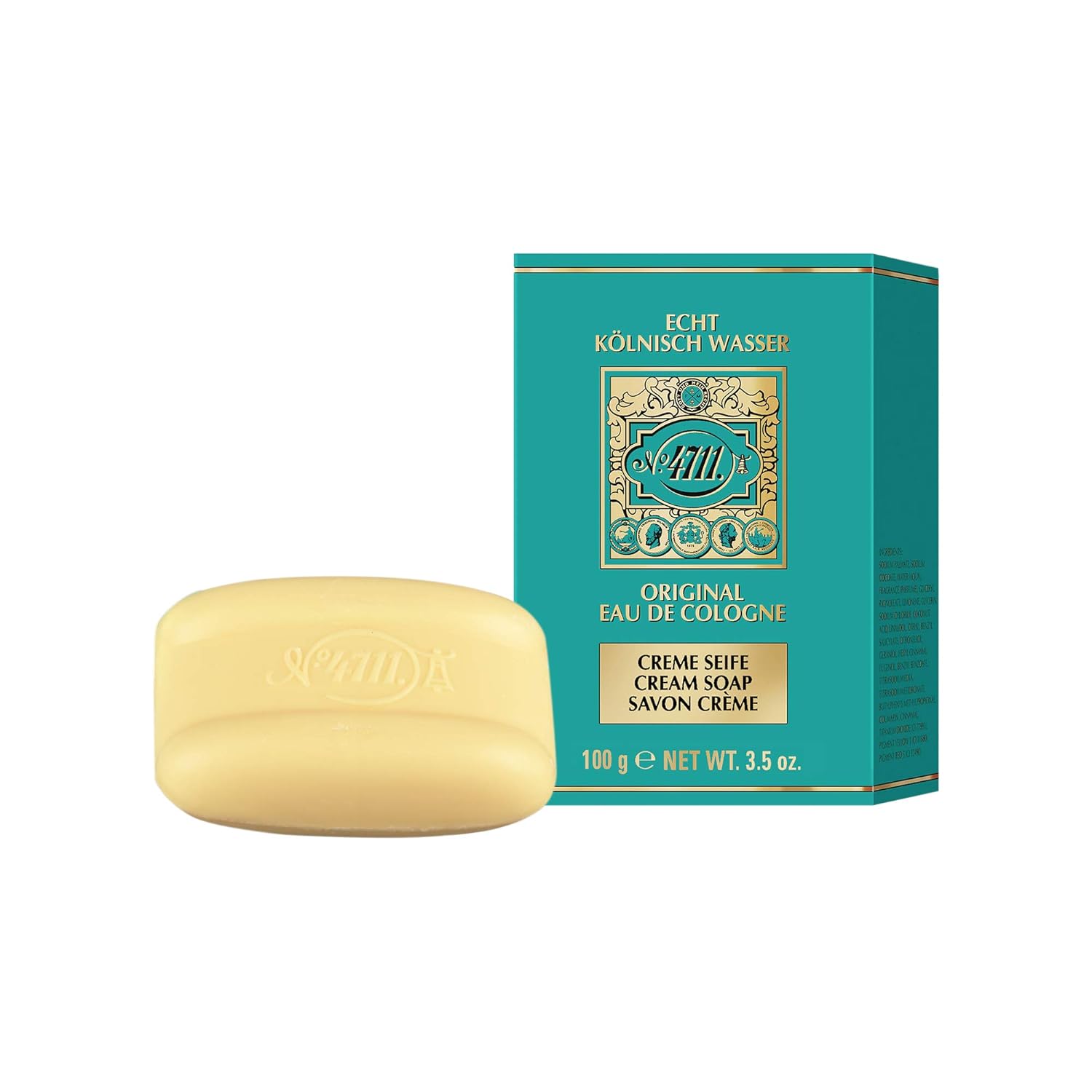 Cream soap bar with embossed logo next to teal and gold packaging, 100g, skincare product